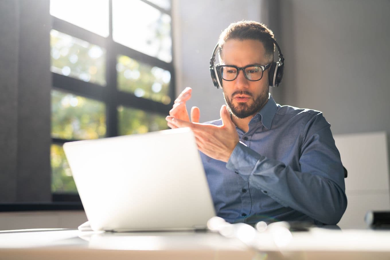 Entrepreneur on a video call at a laptop